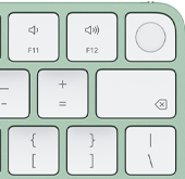 Magic Keyboard, esquina superior derecha, color verde, Touch ID, tecla Suprimir y teclas de función de volumen